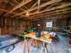 Inside a spacious barn featuring ample storage, workbench, and lawn equipment at 14540 Ne 250Th Ave, Fort Mc Coy, FL 32134