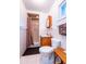 Small bathroom featuring a vanity with sink, shower with curtain, and a toilet at 14540 Ne 250Th Ave, Fort Mc Coy, FL 32134