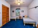 Comfortable bedroom featuring two twin beds, natural light, and a ceiling fan at 14540 Ne 250Th Ave, Fort Mc Coy, FL 32134