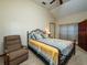 Bedroom with a vaulted ceiling, a comfortable bed, and a neutral color scheme creating a relaxing space at 14540 Ne 250Th Ave, Fort Mc Coy, FL 32134