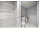 Bathroom featuring toilet, vanity, shelving, and marble floors at 1628 Se 29Th Ter, Ocala, FL 34471