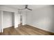 Bedroom featuring wood-look floors and a large closet at 1628 Se 29Th Ter, Ocala, FL 34471