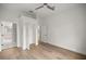 Bright bedroom featuring a large closet and wood-look flooring at 1628 Se 29Th Ter, Ocala, FL 34471