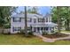 Charming two-story home with unique turret design and a welcoming front porch at 1628 Se 29Th Ter, Ocala, FL 34471