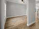 A modern living room featuring wood floors and white trim at 1628 Se 29Th Ter, Ocala, FL 34471