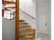 Unique home interior with a winding staircase leading to a higher floor at 1628 Se 29Th Ter, Ocala, FL 34471
