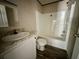Bathroom featuring a shower-tub combo, white vanity with marble countertop, and neutral walls at 1921 Nw 120Th Ave, Ocala, FL 34482