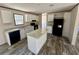 Bright kitchen featuring white cabinetry, a center island, and modern black appliances at 1921 Nw 120Th Ave, Ocala, FL 34482