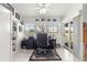 Bright Home office with large desk, chair and view to the outdoors at 1956 Nw 50Th Cir, Ocala, FL 34482