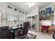 Bright Home Office with large desk, chair, shelves and view to the outdoors at 1956 Nw 50Th Cir, Ocala, FL 34482