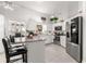 Modern kitchen featuring stainless steel appliances, granite counters, and lots of light at 1956 Nw 50Th Cir, Ocala, FL 34482