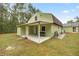 This home has a covered back patio with a grill, making it ideal for outdoor entertaining at 20280 Sw 69Th Pl, Dunnellon, FL 34431
