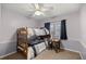 Small bedroom showcasing bunk beds, carpeting, and a window with dark curtains at 20280 Sw 69Th Pl, Dunnellon, FL 34431