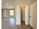 Walk-in closet with shelving and ample storage, conveniently located near other rooms at 2602 Sw 154Th Ln, Ocala, FL 34473