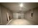 Spacious two-car garage with modern door and ample room for storage at 2602 Sw 154Th Ln, Ocala, FL 34473
