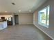 Spacious living area with ample natural light and views of the kitchen at 2602 Sw 154Th Ln, Ocala, FL 34473