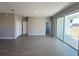 Bright living room area with sliding glass doors leading to the outside at 2602 Sw 154Th Ln, Ocala, FL 34473