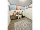 Versatile home office with laminate flooring, offering space for productivity and serenity at 4241 Sw 62Nd Loop, Ocala, FL 34474