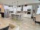 Spacious kitchen with center island, stainless steel appliances, and open layout at 4241 Sw 62Nd Loop, Ocala, FL 34474