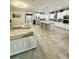 Expansive open-concept living space featuring a gourmet kitchen and inviting living area at 4241 Sw 62Nd Loop, Ocala, FL 34474