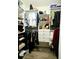Walk-in closet with custom shelving and storage solutions for efficient organization at 4241 Sw 62Nd Loop, Ocala, FL 34474
