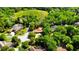 Spacious home with mature trees in a peaceful neighborhood with a large grassy hill nearby at 4301 Se 6 Ave, Ocala, FL 34480