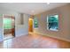 Bright bedroom with natural light, tile flooring, and neutral walls at 4301 Se 6 Ave, Ocala, FL 34480