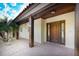 Inviting entryway features a solid wood door and tiled walkway at 4301 Se 6 Ave, Ocala, FL 34480