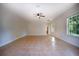 Spacious living room with natural light and neutral wall color at 4301 Se 6 Ave, Ocala, FL 34480