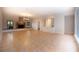 Expansive living room with a brick fireplace and custom built-in shelving at 4301 Se 6 Ave, Ocala, FL 34480