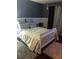 Cozy bedroom with carpet floors, a comfortable bed, and curtains at 4839 Sw 63Rd St, Ocala, FL 34474