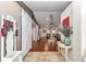 Welcoming foyer features hardwood floors, barn door, and coatrack, offering ample storage at 4839 Sw 63Rd St, Ocala, FL 34474