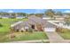 Charming single-story home boasts lush landscaping, a two-car garage, and a well-maintained lawn at 4839 Sw 63Rd St, Ocala, FL 34474