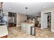 Open kitchen design featuring an island with seating and stainless steel appliances at 4839 Sw 63Rd St, Ocala, FL 34474