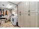 Spacious laundry room with lots of cabinet space, washer, and dryer at 4839 Sw 63Rd St, Ocala, FL 34474