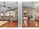 Bright living room featuring wood floors, neutral decor, and an open floor plan at 4839 Sw 63Rd St, Ocala, FL 34474