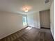 This bedroom features carpeted floors and a double door closet at 5646 Sw 129Th Place Rd, Ocala, FL 34473