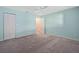 Bedroom featuring carpet, ceiling fan, and closet at 8430 Sw 90Th Ln # A, Ocala, FL 34481