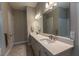 Modern bathroom with double sinks, quartz countertop, and contemporary fixtures at 8843 Sw 57Th Place Rd, Ocala, FL 34481