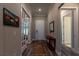 Welcoming foyer featuring hardwood floors, decorative rug, and access to the office at 8843 Sw 57Th Place Rd, Ocala, FL 34481