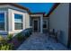 Inviting home showcasing a front patio with chairs at 8843 Sw 57Th Place Rd, Ocala, FL 34481