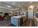Open concept kitchen with a large island and stainless steel appliances at 8843 Sw 57Th Place Rd, Ocala, FL 34481