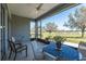 Screened lanai with view of the outdoor space at 8843 Sw 57Th Place Rd, Ocala, FL 34481