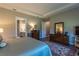 Spacious main bedroom with en suite bath and a large walk-in closet at 8843 Sw 57Th Place Rd, Ocala, FL 34481