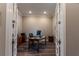 Well-lit home office with hardwood floors, neutral walls, and french doors at 8843 Sw 57Th Place Rd, Ocala, FL 34481
