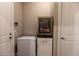 Mini-fridge with clear door, next to counter and cabinet; a convenient space for refreshments at 8843 Sw 57Th Place Rd, Ocala, FL 34481