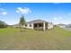 Spacious backyard with a covered screened lanai and room to add a private pool at 10314 Sw 96Th Loop, Ocala, FL 34481
