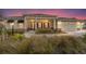 Inviting single-story home with well-manicured landscaping and a cozy front porch at 10314 Sw 96Th Loop, Ocala, FL 34481