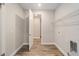 Bright laundry room with wire shelving and a utility sink at 10314 Sw 96Th Loop, Ocala, FL 34481