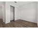 Bedroom featuring luxury vinyl flooring, closet and neutral colored walls at 10557 Sw 98Th Ln, Ocala, FL 34481